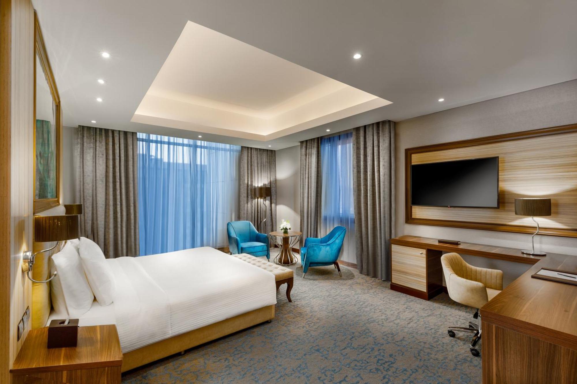 Millennium Place Доха Экстерьер фото Deluxe Room