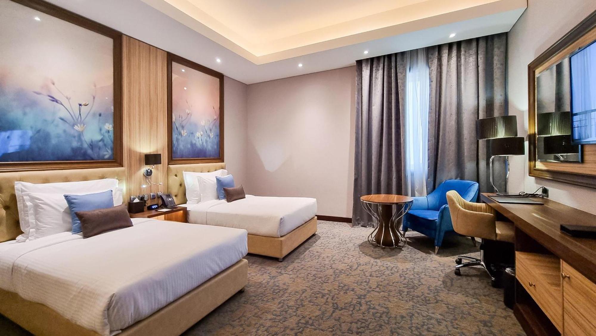 Millennium Place Доха Экстерьер фото Deluxe Room
